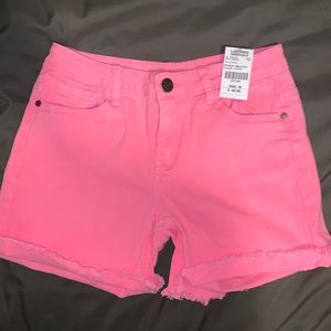 Neon pink raw hem denim shorts in size medium
